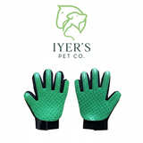 Green pet grooming gloves with black accents on a white background are used for removing loose hair from the pets. 